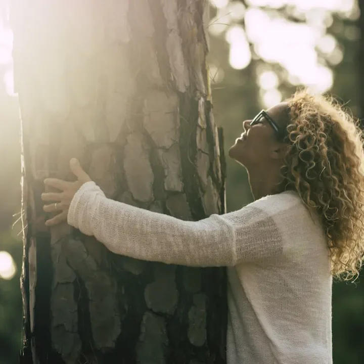 environment-concept-with-beautiful-woman-hug-a-pin-XADQZPH